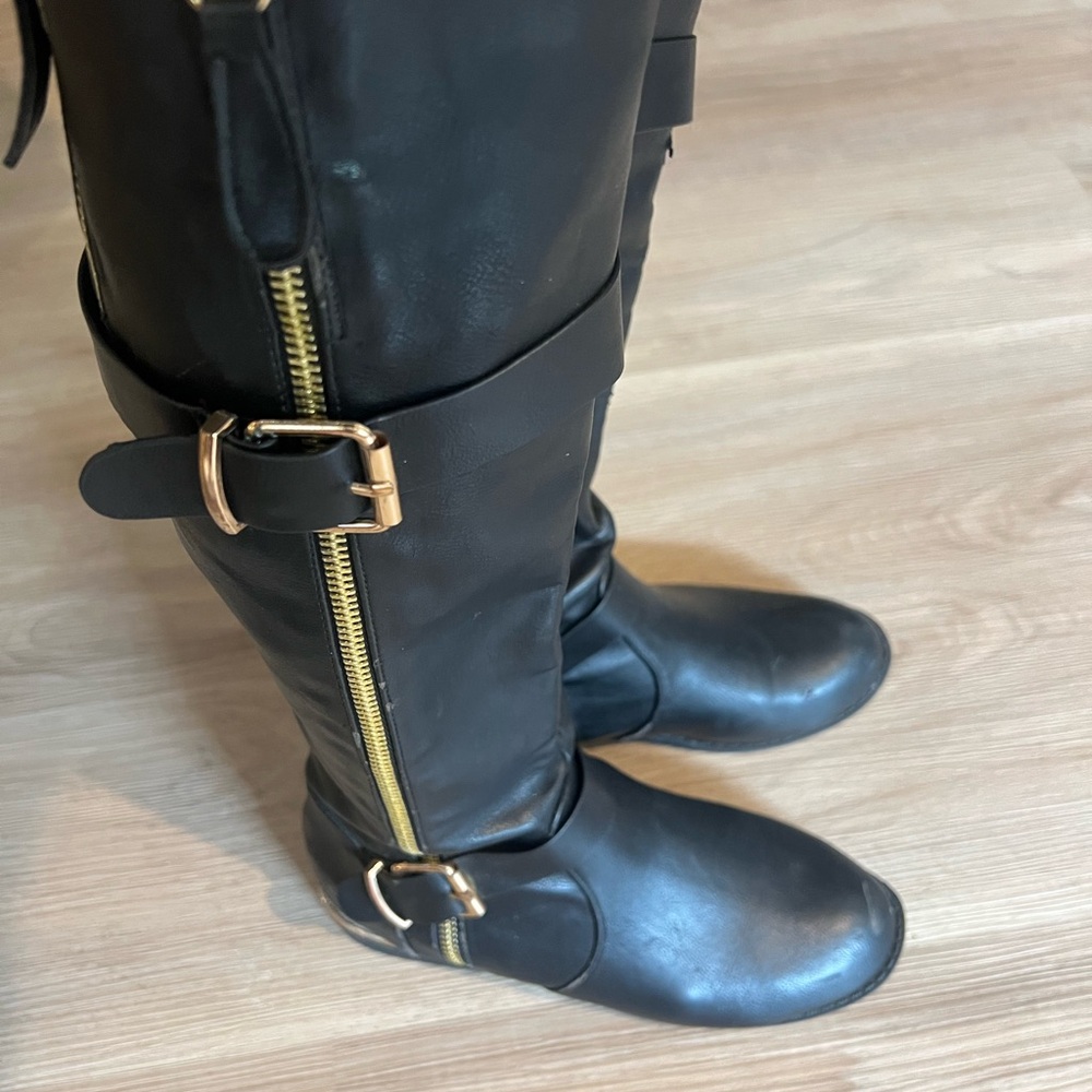 Black Leather Knee-High Boots with Gold Accents